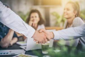 depositphotos_226809968-stock-photo-business-people-shaking-hands-finishing